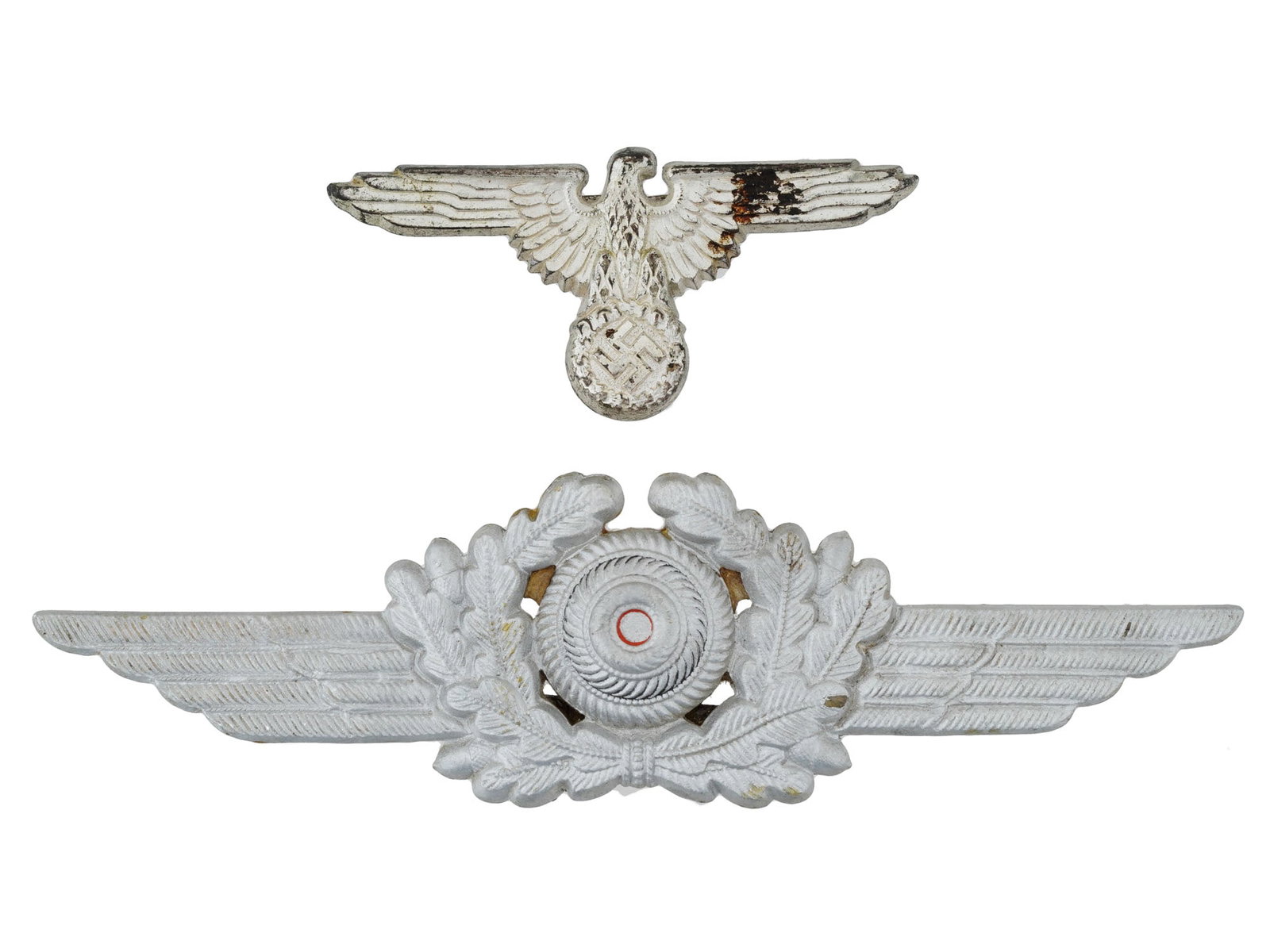 WWII TYPE NAZI GERMAN LUFTWAFFE OFFICES HAT BADGES: WWII type Nazi German Luftwaffe officers visor hat badges, including an eagle and cockade with accents painted in red and black. Second World War Third Reich Tags And Military Collectibles. THI