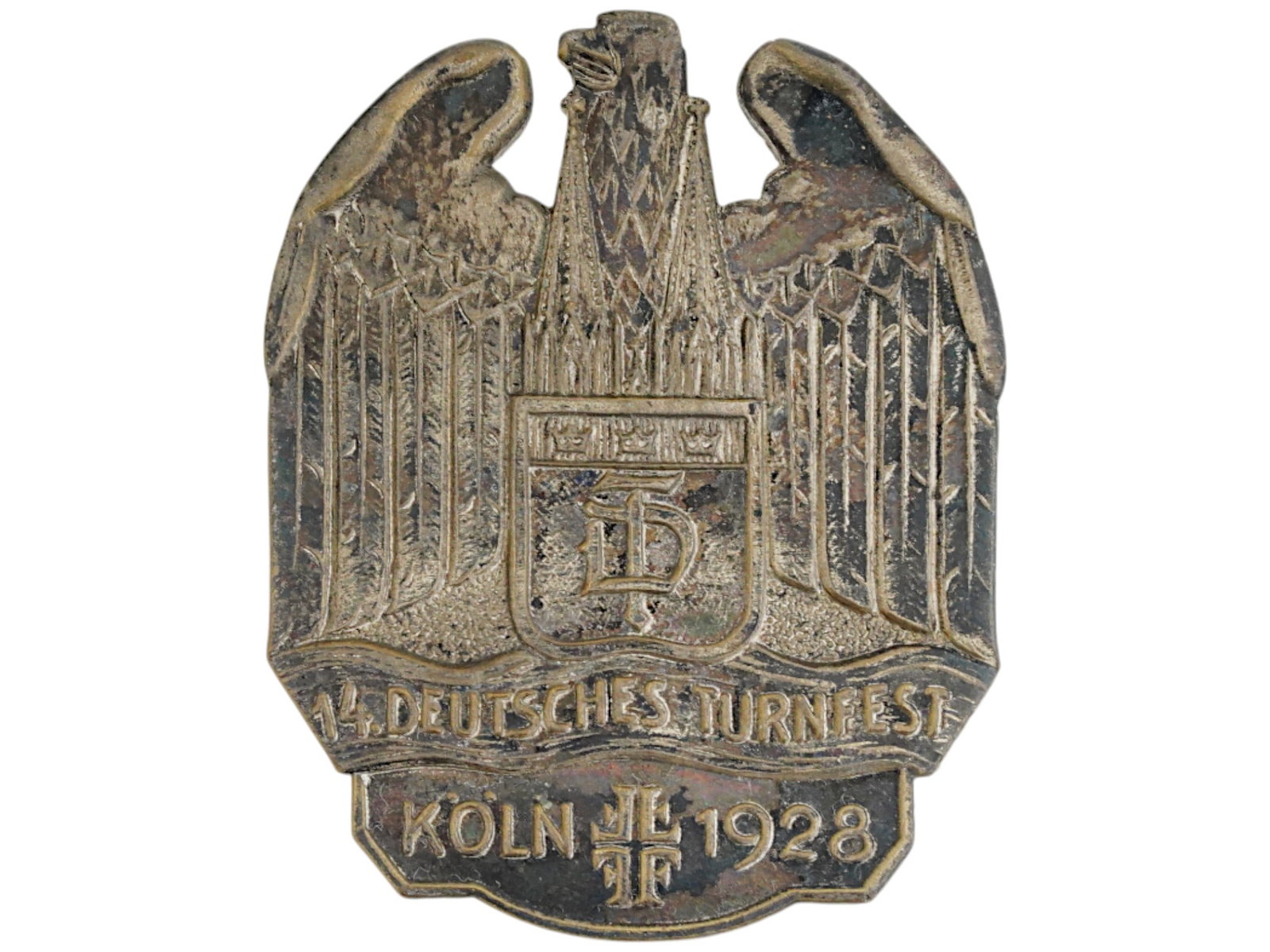 PRE WWII GERMAN 14TH GERMAN TURNFEST BADGE KOLN 1928: A pre WWII German Third Reich 14th German Turnfest Badge Koln 1928. Marked on the reverse: Remmcle and Co, Koln Mulheim. In 1928, the XIV German Gymnastics Festival was held in Cologne. The event was 