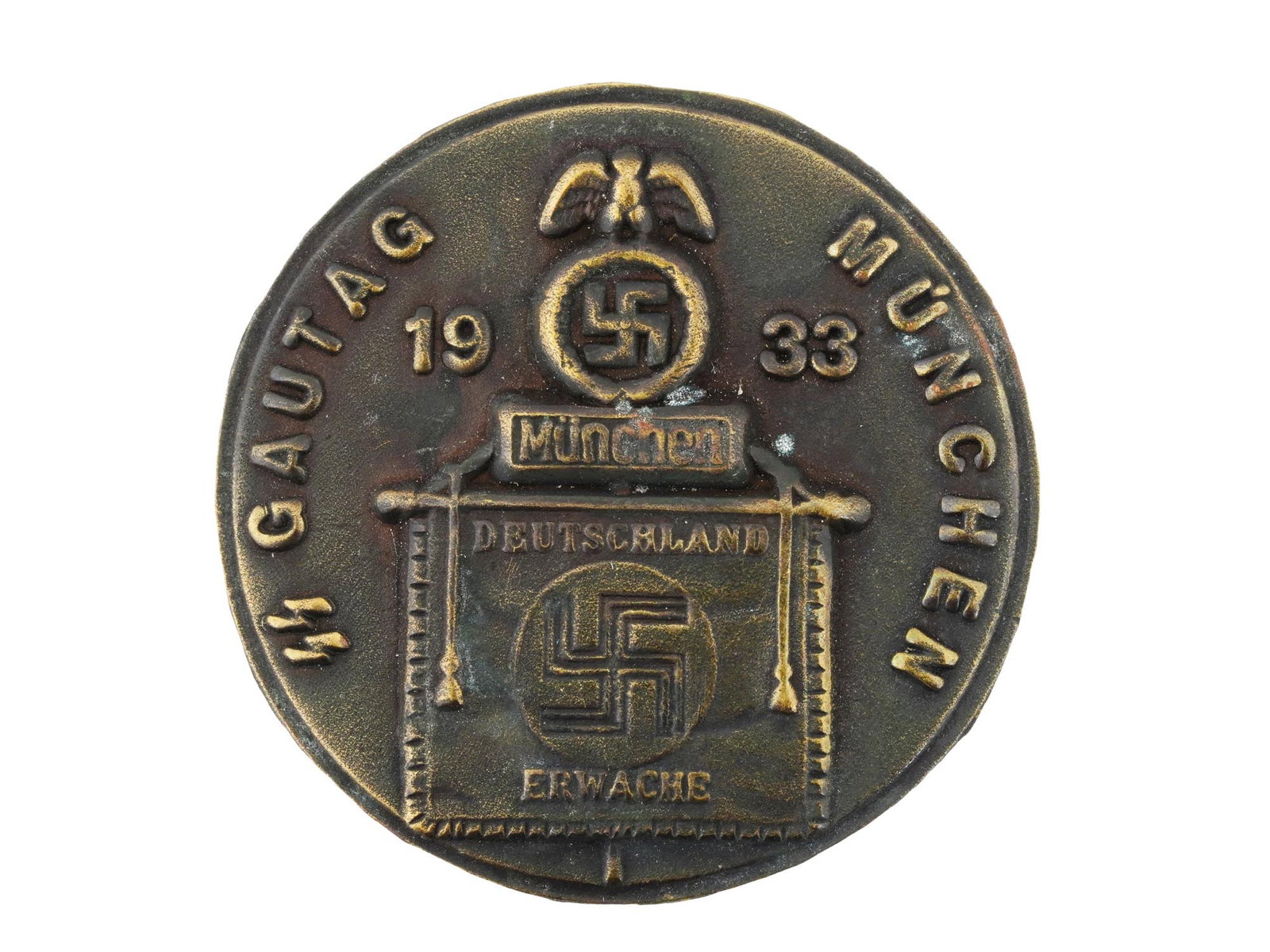 WWII NAZI GERMAN 1933 WAFFEN SS GAUTAG MUNCHEN BADGE: A pre WWII Nazi German 1933 Waffen SS Gautag Munchen pin badge with embossed inscriptions and decor. The Gau was a unit of administrative divisions of Nazi Germany. Second World War Nazi German Third