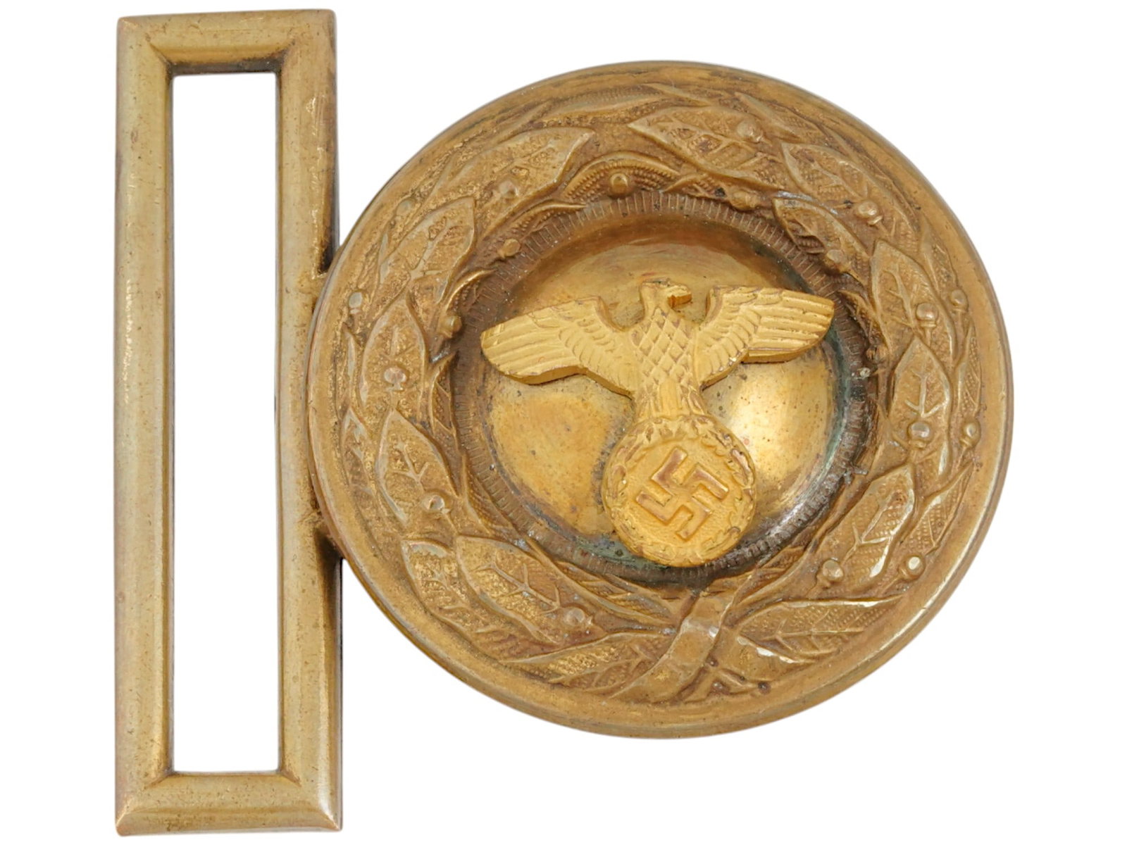WWII MODEL NAZI GERMAN MILITARY BELT BUCKLE: A World War II type Nazi German golden belt buckle with Reichsadler and swastika emblem encompassed with oak leaves. Marked DRGM SS on the backside. Second World War Historical Collectables, Third Rei