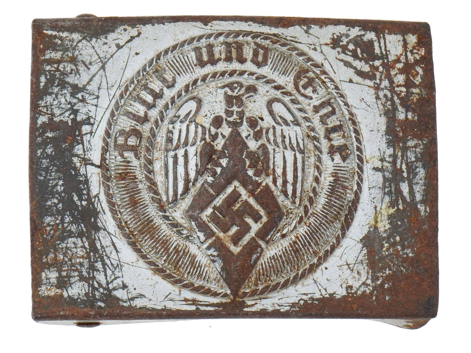 WWII MODEL GERMAN NAZI HITLER YOUTH BELT BUCKLE: A WWII type German Nazi Hitler Youth belt buckle for an enlisted man. The front is engraved with a motto in German, Blut und Ehre, translated to Blood and Honor, and the Hitler Youth eagle clutching t