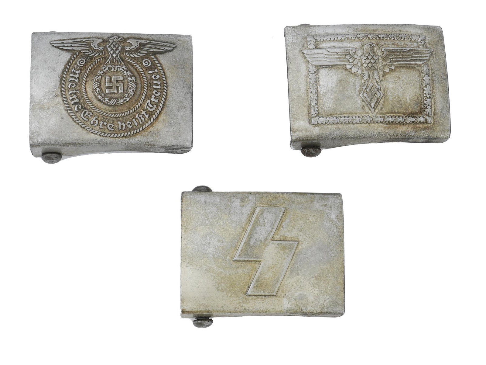 WWII MODEL NAZI GERMAN PERSONNEL BELT BUCKLES: A group of three WWII model Nazi German personnel belt buckles. Including SS officers belt buckle engraved with a Nazi eagle clutching swastika insignia and the motto in German, Meine Ehre Heisst Treu