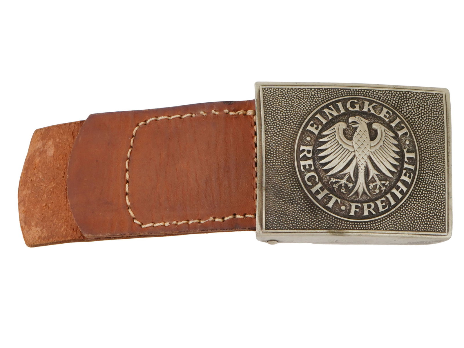 WWII MODEL NAZI GERMAN MILITARY BELT BUCKLE: A World War II type Nazi German military personnel steel belt buckle. Imperial eagle with motto Einigkeit, Recht, Freiheit - Unity, Justice, Freedom. Unmarked. A leather holder is attached. Second Wor