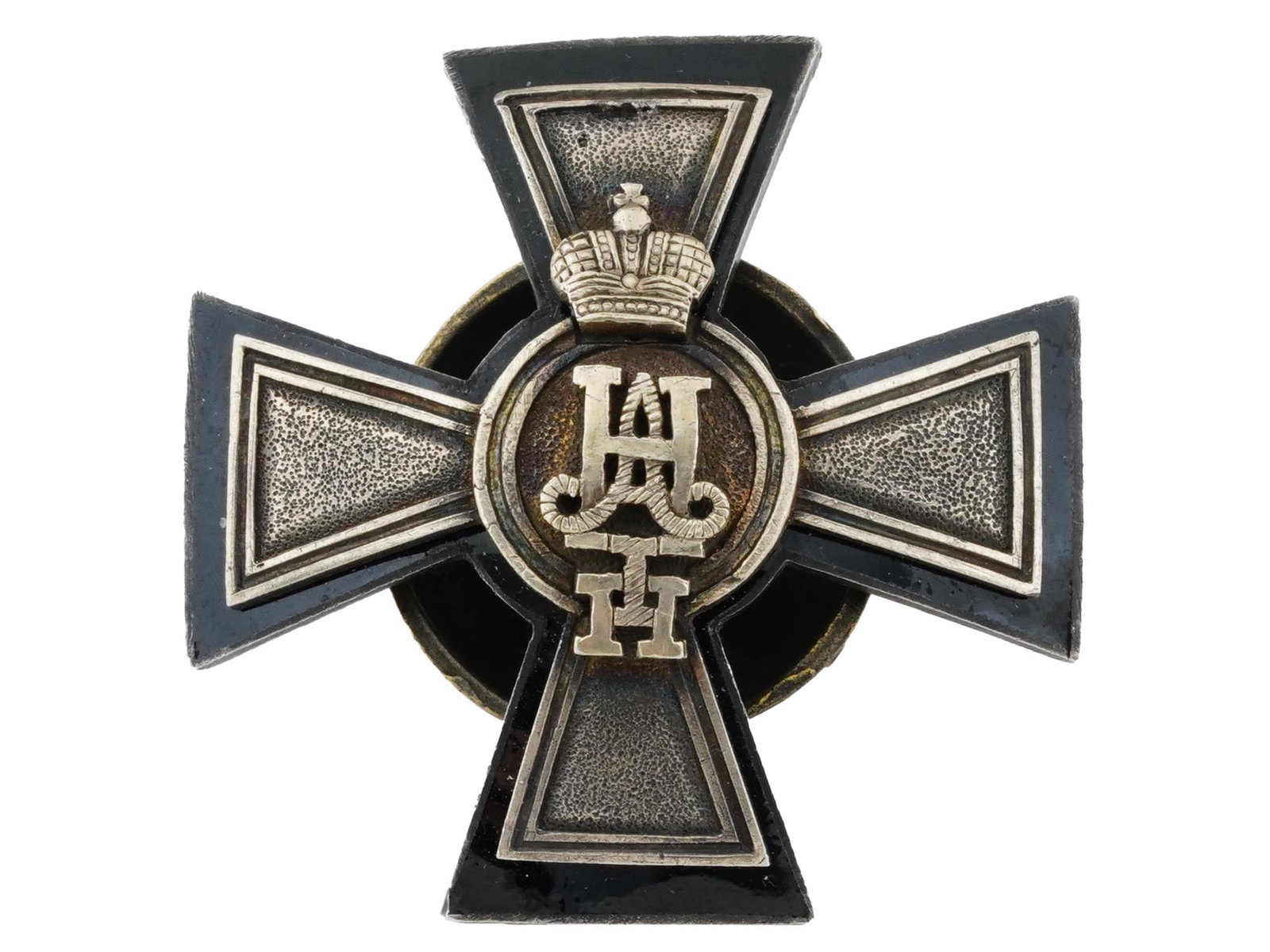 RUSSIAN 4TH KOPOSHSKY INFANTRY REGIMENT SILVER BADGE: A Russian 4th Koposhsky Infantry Regiment silver badge. The badge is modeled as a black enamel cross overlaid with a gilt silver cross in the shape of the St. George cross, in the center of the cross 