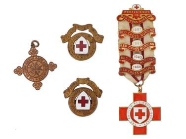 FOUR VINTAGE BRITISH RED CROSS SOCIETY BADGES