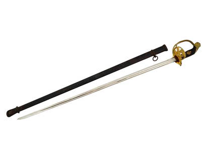 ANTIQUE PRUSSIAN INFANTRY OFFICERS SWORD WILHELM II: An antique German infantry officers sword, featuring a straight nickel-plated blade. The gilded brass hilt includes a folding guard decorated with a Prussian eagle, a ribbed grip with the cipher of Wi