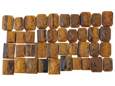LOT OF WARRIOR PORTRAIT CARVED TIGER EYE CAMEOS