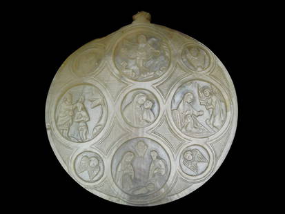 CARVED MOTHER OF PEARL SEA SHELL RELIGIOUS PLAQUE: A vintage carved mother of pearl sea shell plaque. The shell plaque is decorated with hand carved round medallions depicting biblical scenes from the life of Jesus Christ. Religious Pieces, Tableware,