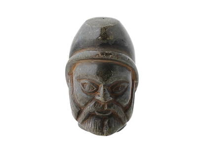 200 AD ANCIENT SYRIAN CARVED STONE MALE HEAD AMULET: An ancient Syrian hand carved stone amulet. The amulet depicts a bearded male head in a cap. Circa: 200 AD. Ancient Middle Eastern Carved Stone Amulets, Museum Pieces, and Collectibles. THIS LO