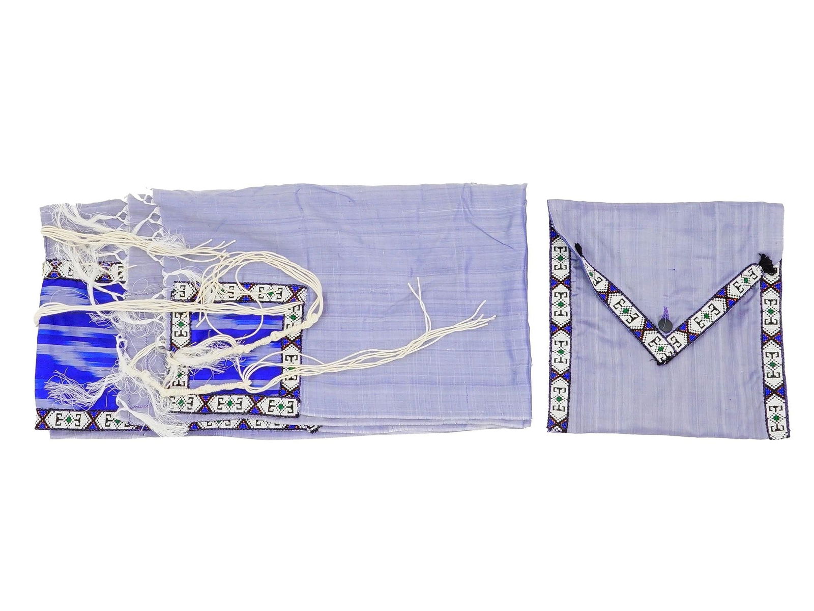 VINTAGE JUDAICA TALLIT AND TALLIT BAG SET IN LIGHT BLUE: A vintage Judaica tallit and tallit bag set in light blue. Both crafted from fine silk and decorated with embroidery elements. This elegant ensemble reflects traditional craftsmanship and serves both