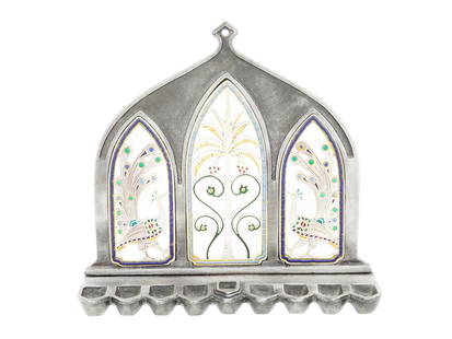 20TH CEN JUDAICA ENAMEL METAL HANUKKAH MENORAH LAMP: A 20th century Judaica enamel metal Hanukkah Menorah lamp. The menorah boasts three elegantly arched windows adorned with a symmetrical colorful enamel design representing floral, foliage and peacock