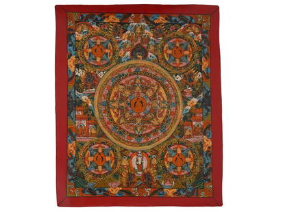 TIBETAN BUDDHIST THANGKA MANDALA PAINTING ON FABRIC: A Tibetan Buddhist Thangka polychrome painting on cotton. The thangka features a mandala, a symmetrical design in the tantric yoga of Buddhism and Hinduism, generally symbolizing the world, the univer