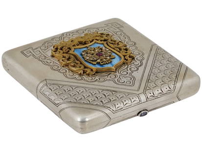 RUSSIAN SILVER ENAMEL DIAMONDS CIGARETTE CASE: A Russian silver cigarette case embellished with enamel and diamonds, featuring engraved geometric patterns on the silver surface and a central overlay foliate decorative element and a light blue guil