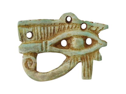 ANCIENT EGYPTIAN PTOLEMAIC STONE EYE OF HORUS AMULET: An ancient Egyptian stone Eye of Horus amulet, dating to the Ptolemaic Period, circa 305 to 30 BC. Carved from durable stone, this protective symbol, also known as the Wedjat, was widely used in ancie