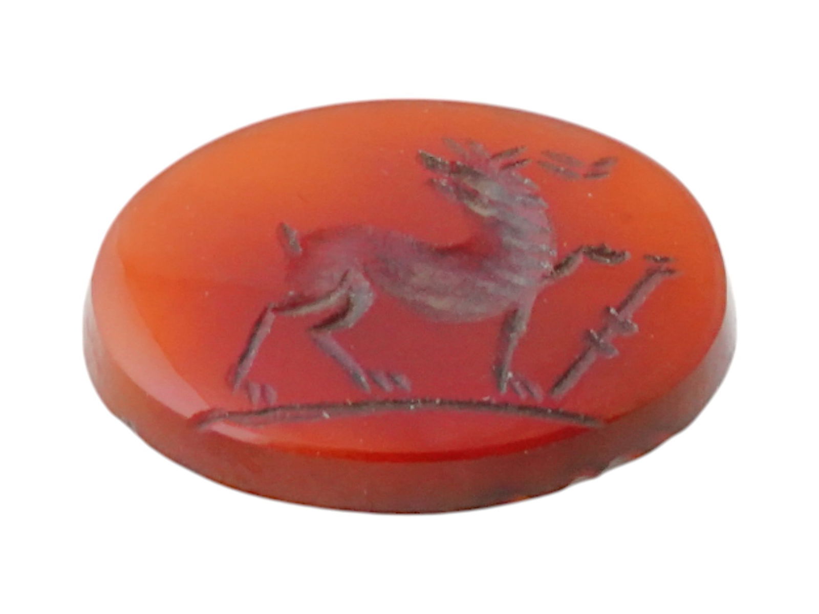 100 AD ANCIENT ROMAN CARNELIAN INTAGLIO W STAG: An ancient Roman carved Carnelian stone intaglio seal. The intaglio is adorned with an incised design representing a stag. Circa: 100 AD. Ancient Roman Carved Natural Stone Intaglios, Seal and Stamps,