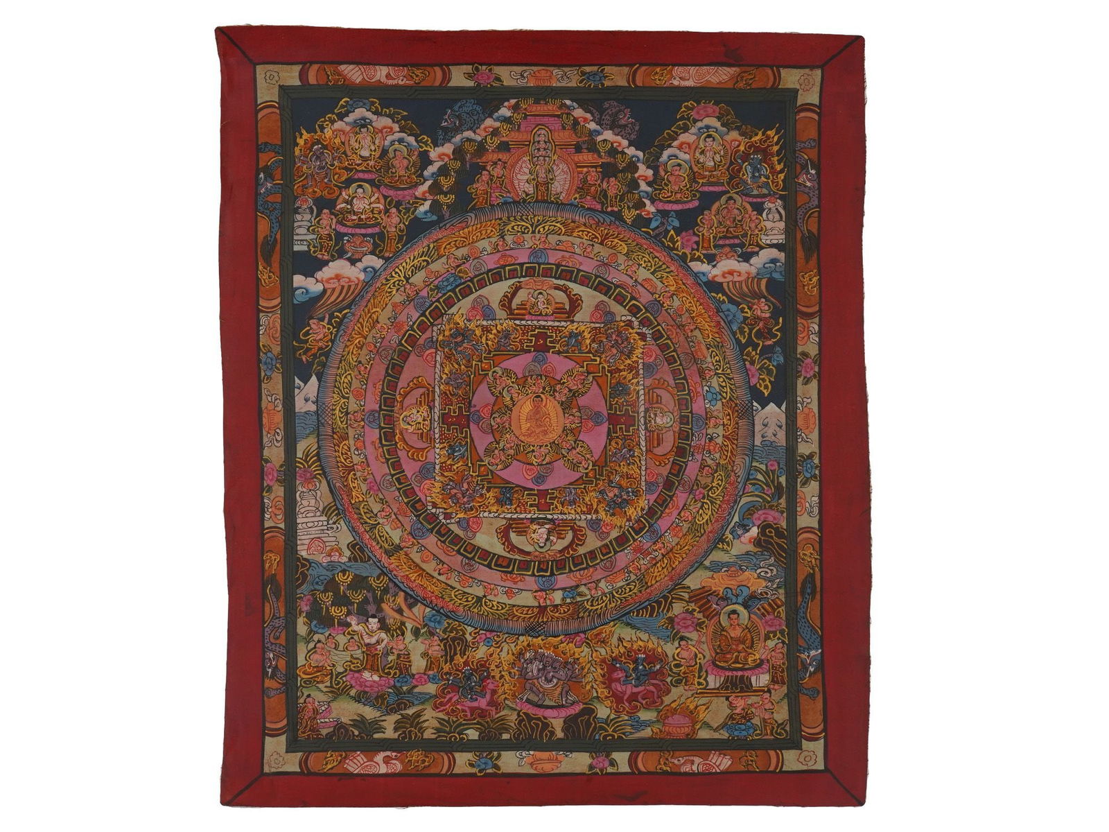 TIBETAN BUDDHIST THANGKA MANDALA PAINTING ON FABRIC: A Tibetan Buddhist Thangka polychrome painting on cotton. The thangka features a mandala, a symmetrical design in the tantric yoga of Buddhism and Hinduism, generally symbolizing the world, the univer