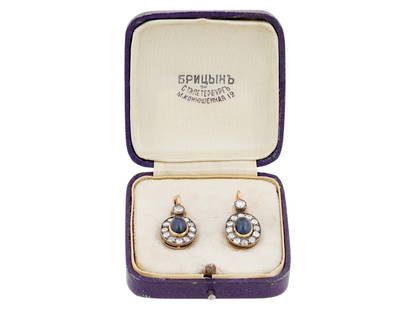 RUSSIAN 14K GOLD DIAMONDS AND SAPPHIRE EARRINGS: A fine pair of Russian 14k gold, diamond, and sapphire earrings. The earrings feature deep blue oval sapphires surrounded by brilliant cut white diamonds. Hallmarked with 56 Russian gold standards for