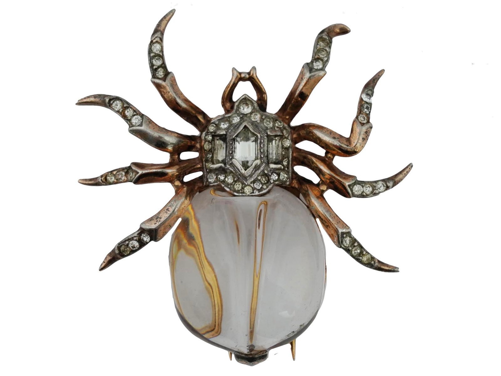 TRIFARI JELLY BELLY SPIDER COSTUME JEWELRY CLIP: A mid 20th century Trifari costume jewelry clip. The clip is made in a highly detailed spider design with a crystal clear jelly belly and blinding clear stones. Marked, Trifari brand logo, Des. Pat.,
