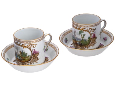 PAIR OF RUSSIAN STYLE PORCELAIN CUPS AND SAUCERS