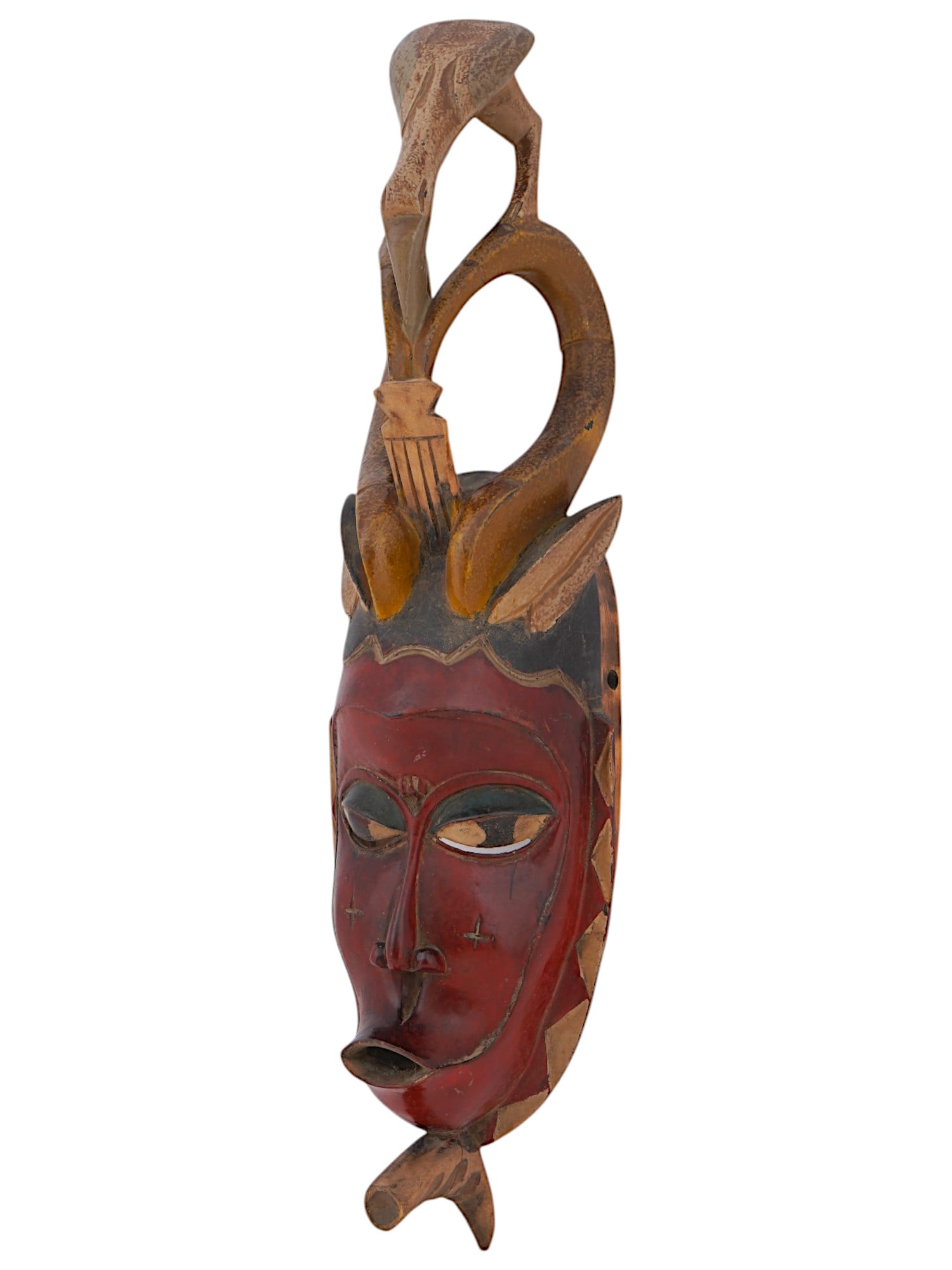 WEST AFRICAN BAULE PEOPLE WOOD MASK FROM IVORY COAST: A West African Baule people hand carved wooden mask from Ivory Coast. The Baule people are known for their intricate and expressive masks, which are often used in traditional ceremonies and rituals. T