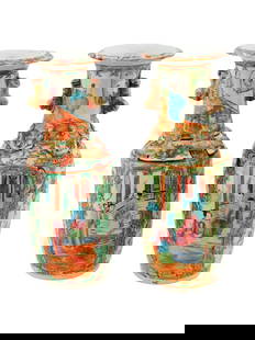 PAIR OF VINTAGE CHINESE CANTONESE FAMILLE ROSE VASES: A pair of vintage Chinese Cantonese Famille Rose vases, each decorated with panels showcasing palace scenes and birds, and featuring temple lion and serpent motifs around the necks. Marked to the unde