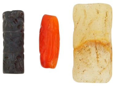 COLLECTION OF CYLINDER FORM CARVED STONE SEALS
