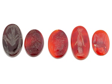 FIVE ANCIENT ROMAN ENGRAVED CORNELIAN INTAGLIOS