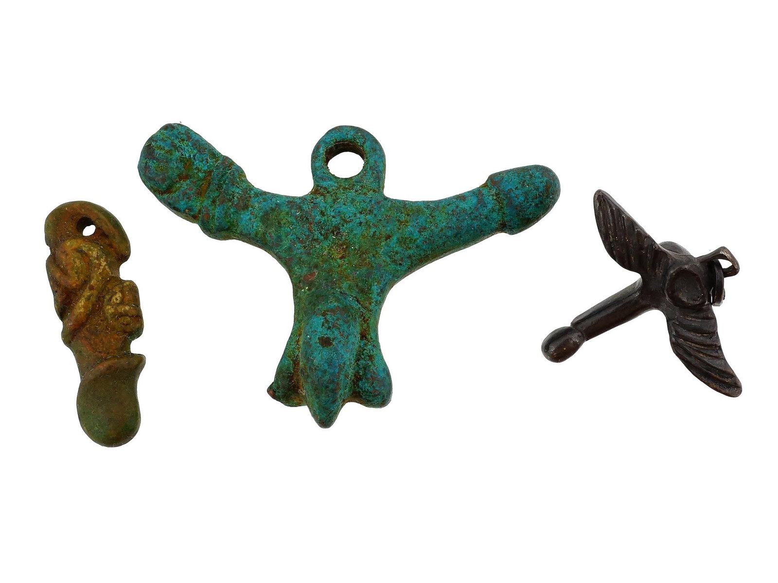 ANCIENT ROMAN BRONZE AND SILVER FIGURAL EROTIC PENDANTS: A lot of three ancient Roman bronze and silver figural erotic pendants. The first pendant depicts a phallus with a monkey wrapped around it. The second depicts two phalluses on either side. The third 