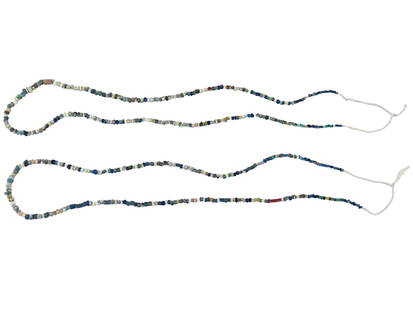 TWO ANCIENT ROMAN GLASS BEAD NECKLACES 100 TO 300 AD: A lot of two ancient Roman multicolored glass bead necklaces, each featuring an array of vibrant and varied hues, circa 100 to 300 AD. Composed of carefully crafted glass beads, display a remarkable s
