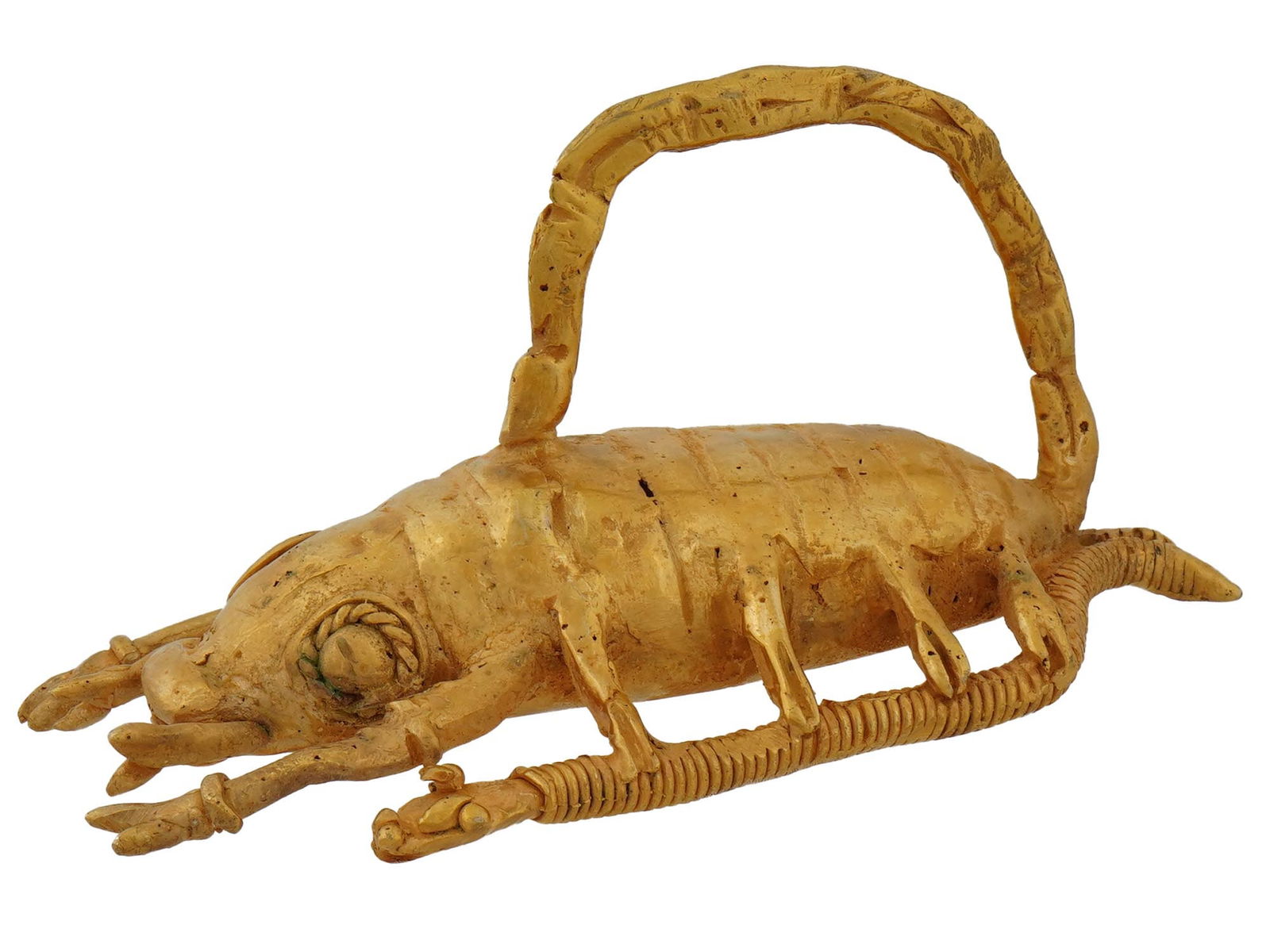 SOUTH AMERICAN TAIRONA TUMBAGA SCORPION FIGURINE: South American tumbaga figurine of a scorpion. Tumbaga, an alloy of gold and copper, was commonly utilized by Indigenous cultures for crafting various objects, showcasing their advanced metallurgical