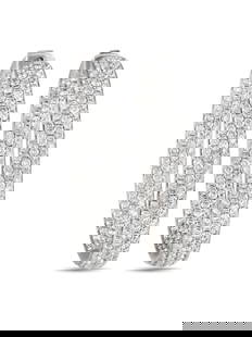 EXCLUSIVE 14K GOLD DIAMOND INSIDE-OUT HOOP EARRINGS: Sparkling diamonds with a total weight of 6.10 carats make seemingly every inch of these exquisite hoop earrings come alive whenever they catch the light. Set in 14K White Gold, each one measures 1.5