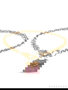 Hermes Amulettes Kelly 18K Rose Gold Pink Sapphire Bracelet: This Hermes Amulettes Kelly bracelet brings the luxury brands iconic leather goods to the world of precious jewelry. On this impeccably crafted piece, a perfectly proportioned charm depicting the clas