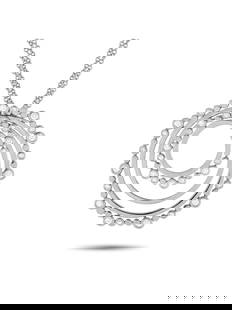 Bucherer 18K White Gold 0.69ct Diamond Circle Necklace: A versatile jewel you can wear time and time again. This white gold necklace by Bucherer features a 30-inch-long double chain holding a round pendant with concentric circles. The 1.5-inch-wide pendant