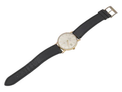 VINTAGE OMEGA SEAMASTER CALENDAR MENS WRIST WATCH: A vintage Omega Seamaster Calendar mens wrist watch, dating to the 1950s. Crafted in a solid 18K gold case, this timepiece features a mechanical movement with 17 jewels, a date aperture at 3 oclock, a
