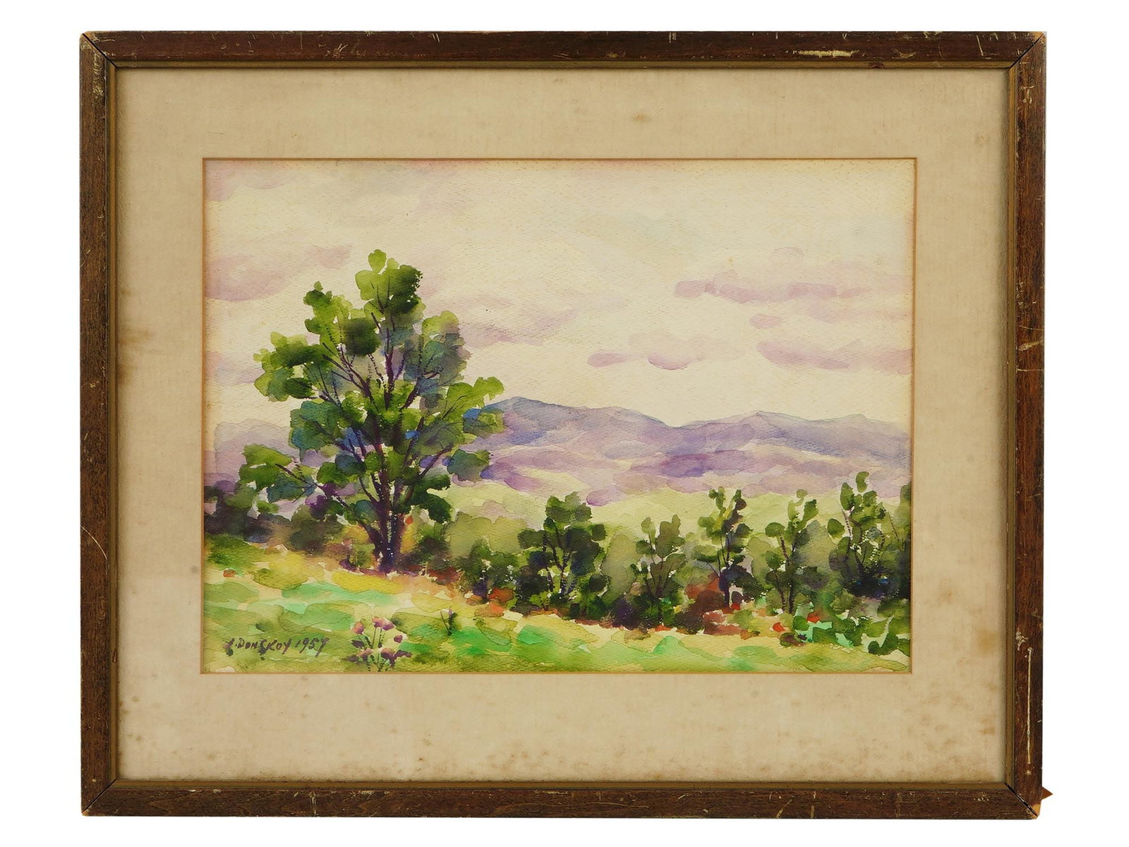LANDSCAPE WATERCOLOR PAINTING SIGNED I. DONSKOY: Watercolor on paper painting. American, mid-20th century. The artwork depicts a field panorama. Signed by the artist, I. Donskoy, and dated 1957 in the lower left. Matted and framed. Collectible Graph