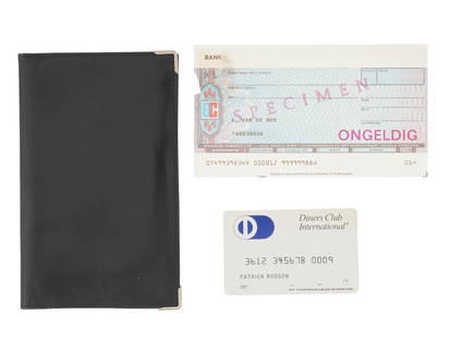 VINTAGE ITALIAN BLACK LEATHER BILLFOLD: A vintage Italian leather billfold. Vertical wallet with multiple card slots. The lot also feature a Dutch paycheque and Diners Club International cards. Vintage Leather Goods And Accessories.