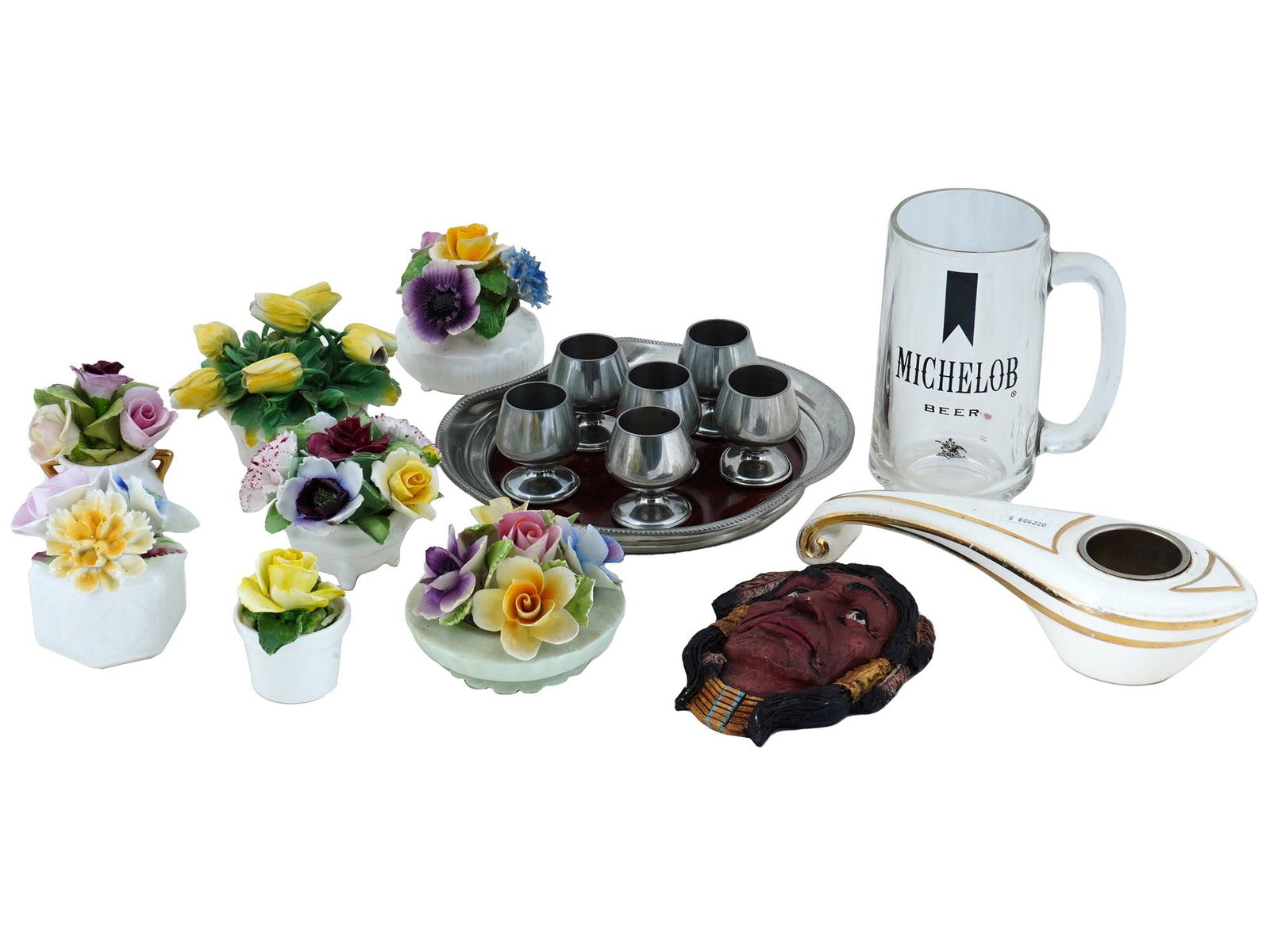 VINTAGE PORCELAIN FLOWERS WINE GLASSES RONSON LIGHTER: A lot of Bone China porcelain flowers, a set of Revere Pewter wine glasses on a tray by Formica, a glass Michelob beer cup, Indian head wall plaque, and Varaflame Fantasy lighter by Ronson. Porcelain