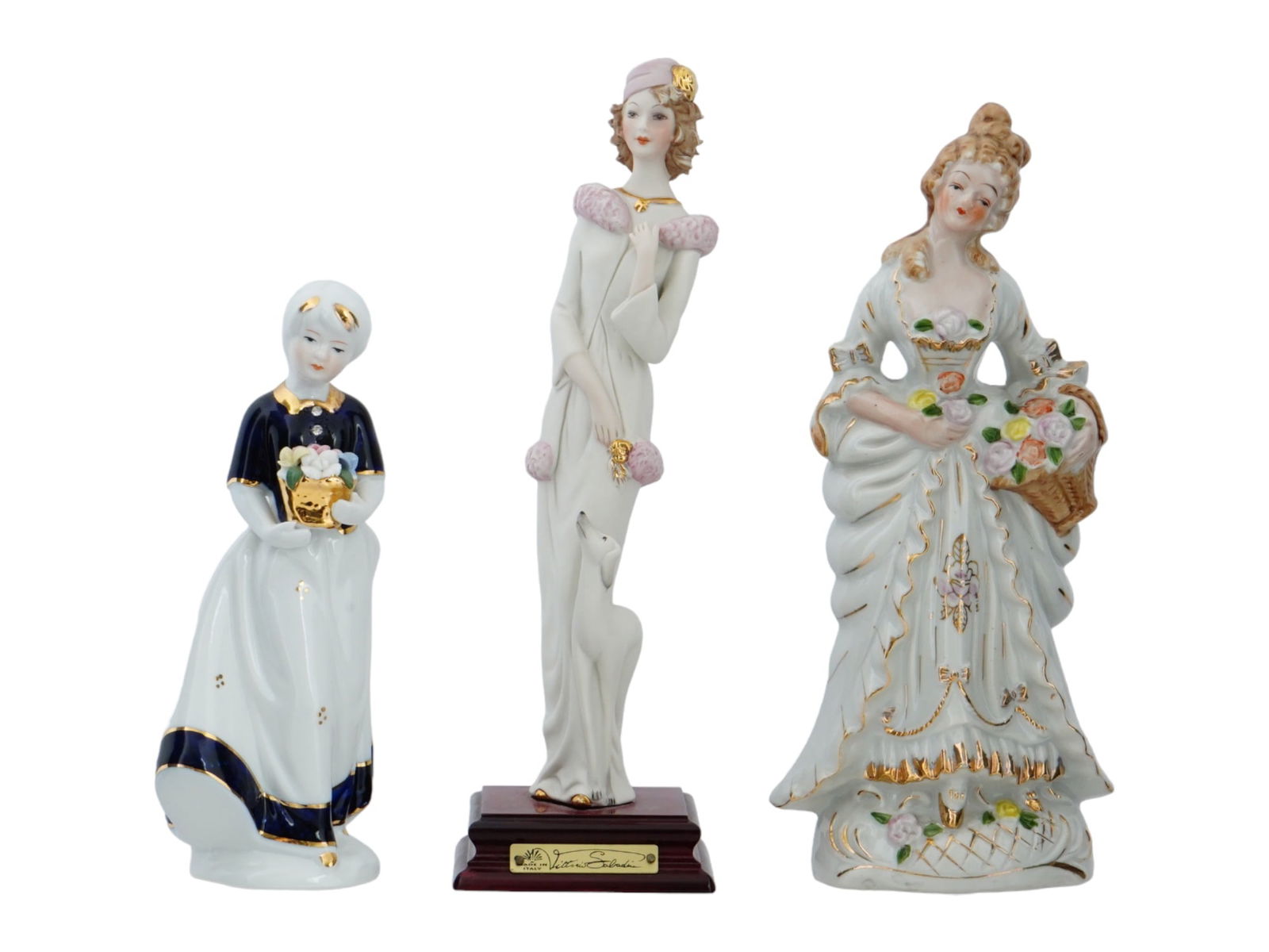 VITTORIO SABADIN CAPODIMONTE PORCELAIN FEMALE FIGURINES: A lot of three large vintage glazed porcelain figurines. First. A figure of a young woman with a dog, pink and gilt accents. Crowned N mark of Capodimonte porcelain, Italy, Vittorio Sabadin on the bac