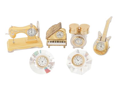 LAURIER AND XANADU FIGURATIVE NOVELTY DESK CLOCKS: A lot of vintage novelty clocks for table or shelf decor. A total of six items. Two watches in form of crystals by Laurier. Four white and golden watches by Xanadu representing a sewing machine, a gra