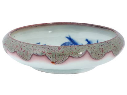 ANTIQUE CHINESE QING DYNASTY PORCELAIN BRUSH WASHER: An antique Chinese Qing Dynasty porcelain brush washer decorated with a blue-painted landscape motif inside. Brush washers were used by scholars and artists to clean and store their calligraphy and pa