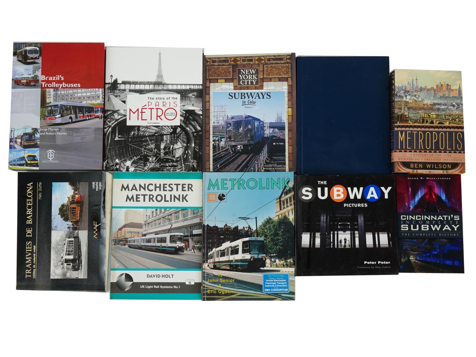 VINTAGE GLOBAL PUBLIC TRANSPORT SYSTEM HISTORY BOOKS: A collection of vintage books on global transit systems, offering a diverse narrative of urban transportation history. Titles like The History of the Paris Metro and Tramways of Barcelona provide in-d