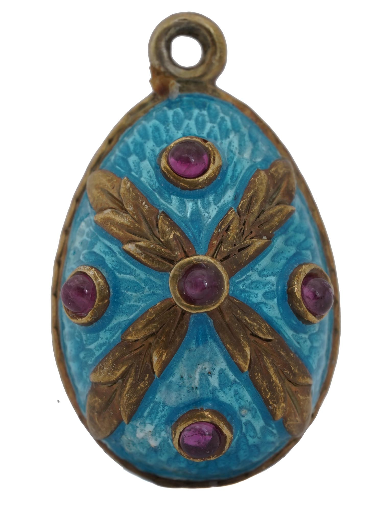RUSSIAN GUILLOCHE ENAMEL AND RUBIES EGG PENDANT: A miniature Russian egg pendant covered with bright turquoise guilloche enamel and set with five round ruby cabochons on each side. No visible hallmarks. Collectible Russian Fine Jewelry, Gifts And Ac