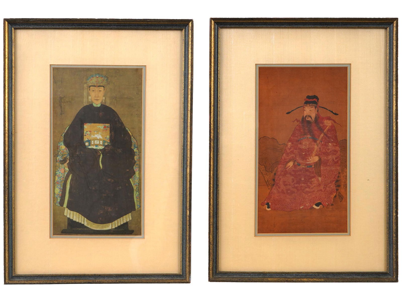 CHINESE EMPRESS AND MANDARIN PAINTINGS ON SILK: A pair of vintage American portrait paintings on silk made and distributed by Rudolf Lesch Fine Arts, Inc., New York. Circa mid 20th century, 1950s. The paintings depict Chinese portraits of influenti