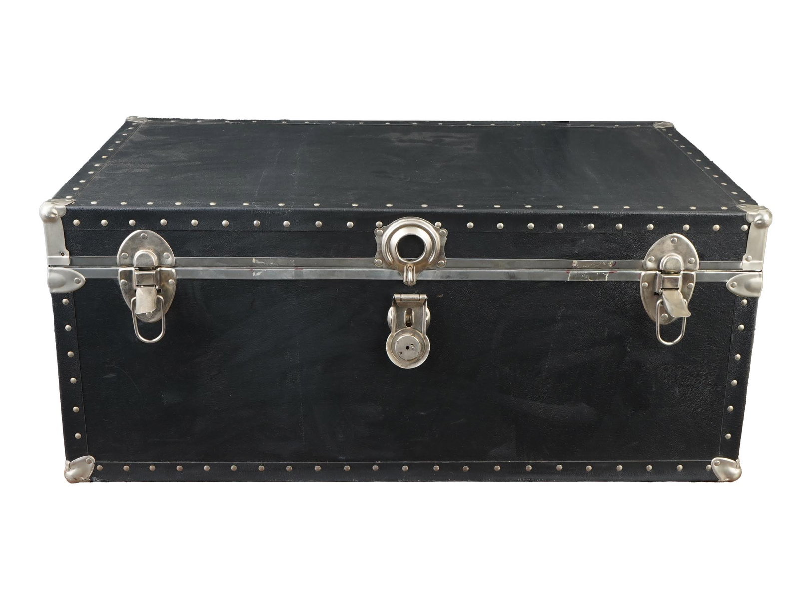 LARGE VINTAGE BLACK LEATHER TRAVEL TRUCK WITH HANDLES: A large vintage black leather travel truck. Features silver-tone metal clasps and handles on both sides for ease of transport. The lock is marked T46 LONG. A classic example of mid-20th-century travel