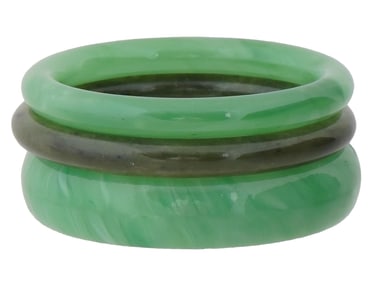 COLLECTION OF CARVED JADE AND STONE BANGLE BRACELETS