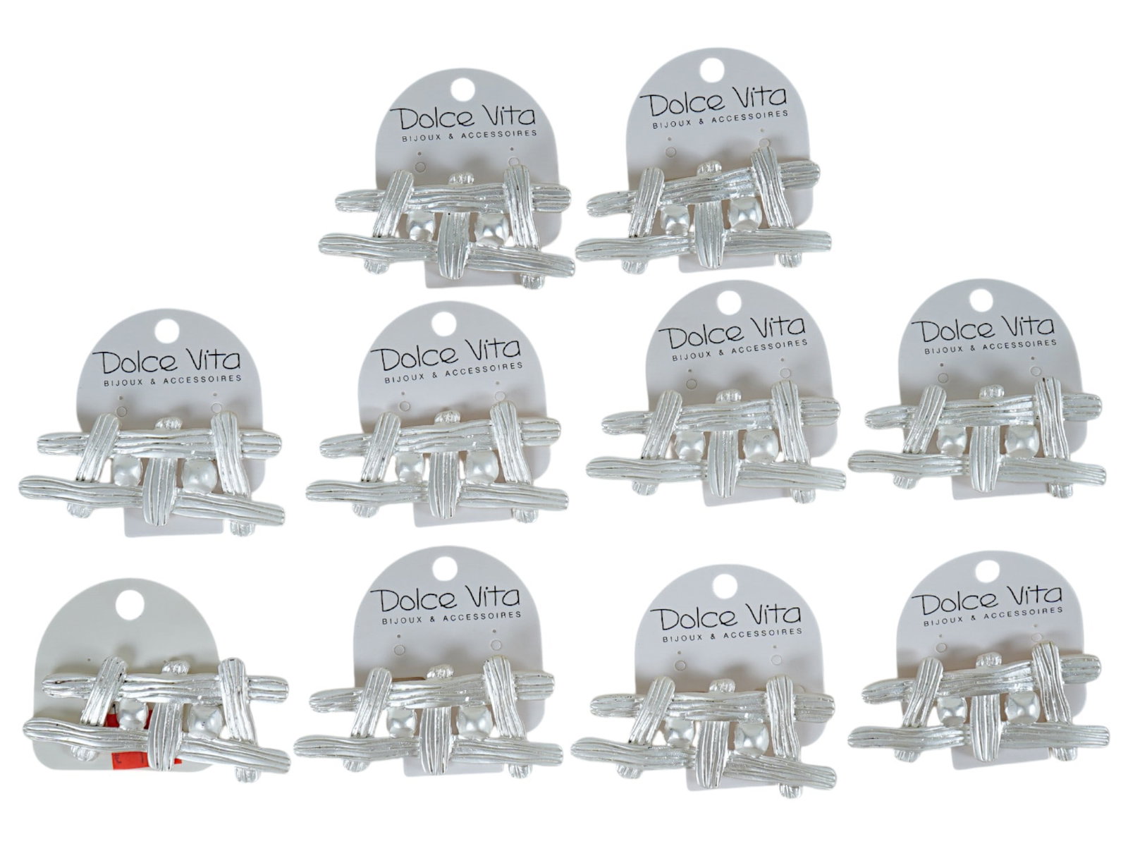VINTAGE FRENCH DOLCE VITA COSTUME JEWELRY BROOCHES: A group of 10 vintage French Dolce Vita costume jewelry, a total of 10 brooches, circa from the 1980s. Silver tone metal. Original display cards with the brands logo. Dolce Vita was a jewelry atelier 