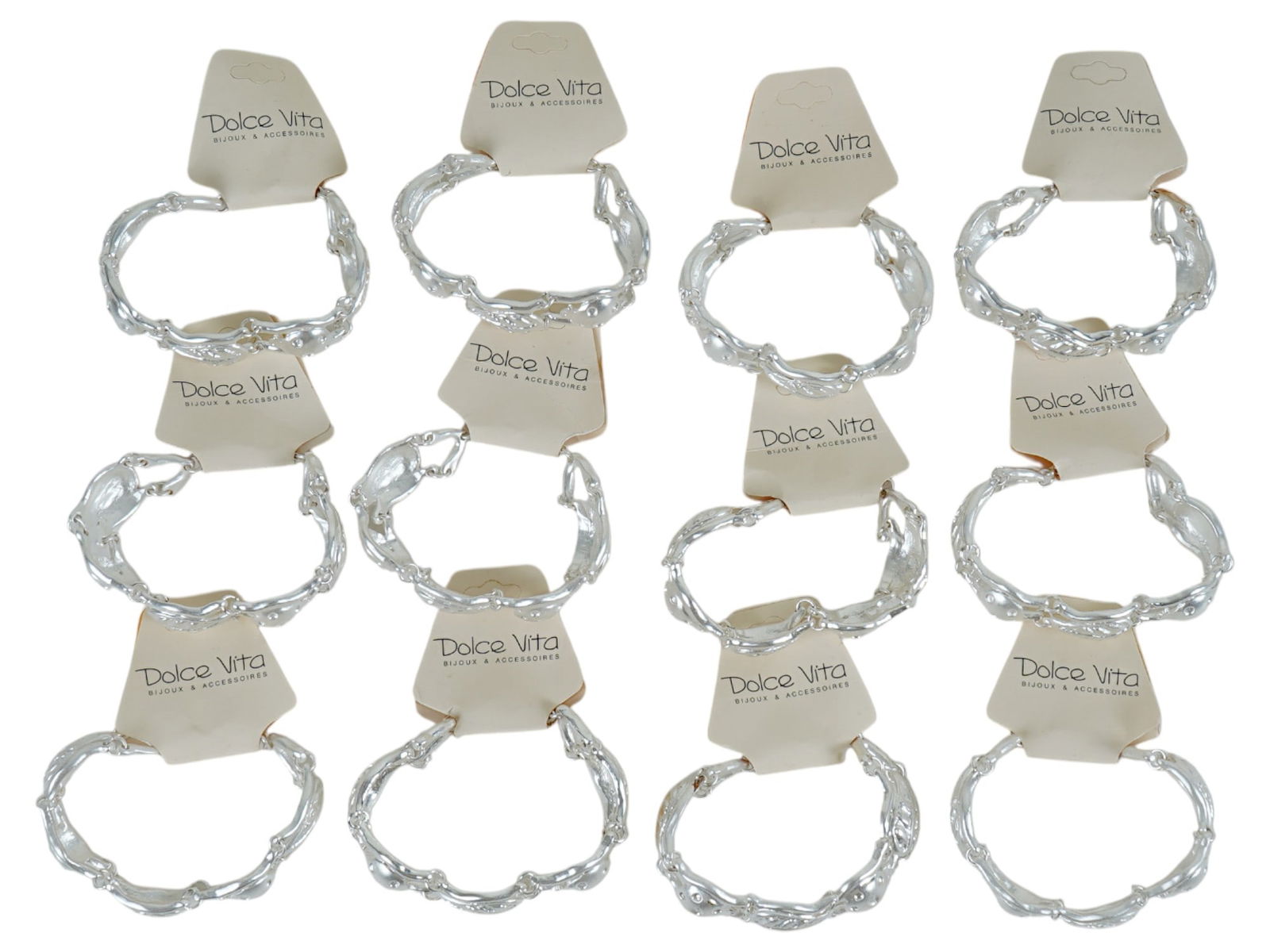 LOT OF FRENCH DOLCE VITA LINK BRACELETS: A lot of vintage French Dolce Vita costume jewelry, a total of 12 silver-tone link bracelets. Ca. 1980s. Original labels are preserved. The links are shaped as tree leaves. Dolce Vita was a jewelry at