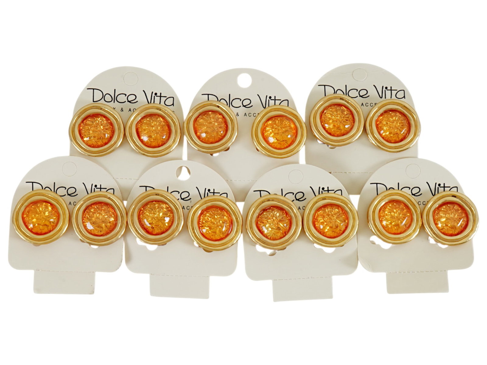 LOT OF 7 FRENCH DOLCE VITA COSTUME JEWELRY CLIP EARRINGS: A collection of seven pairs of vintage French Dolce Vita Paris costume jewelry clip earrings. Presumably made in the 1980s. The gold tone earrings are made in a circular ribbed design and encrusted wi