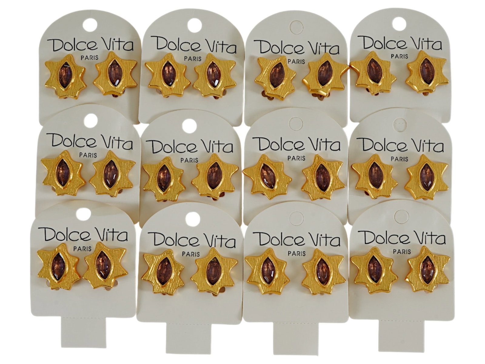 LOT OF 12 FRENCH DOLCE VITA COSTUME JEWELRY CLIP EARRINGS: A collection of twelve pairs of vintage French Dolce Vita Paris costume jewelry clip earrings. Presumably made in the 1980s. The gold tone earrings are made in an abstract design and encrusted with a 