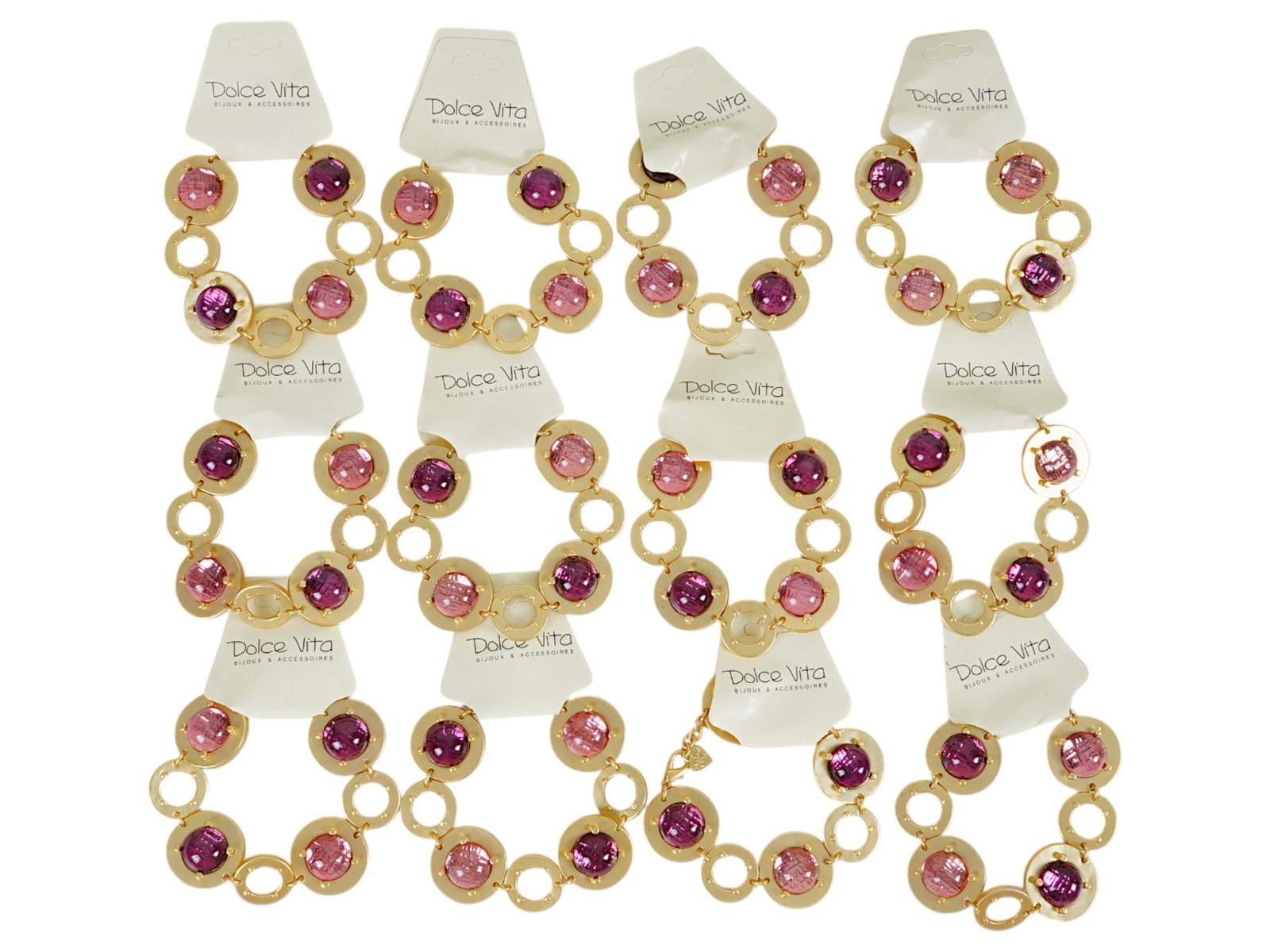 LOT OF 12 FRENCH DOLCE VITA COSTUME JEWELRY BRACELETS: A collection of twelve French Dolce Vita Paris costume jewelry bracelets. Each gold tone bracelet is made in a chain link design featuring circular form links, encrusted with faux gemstones. Each is m
